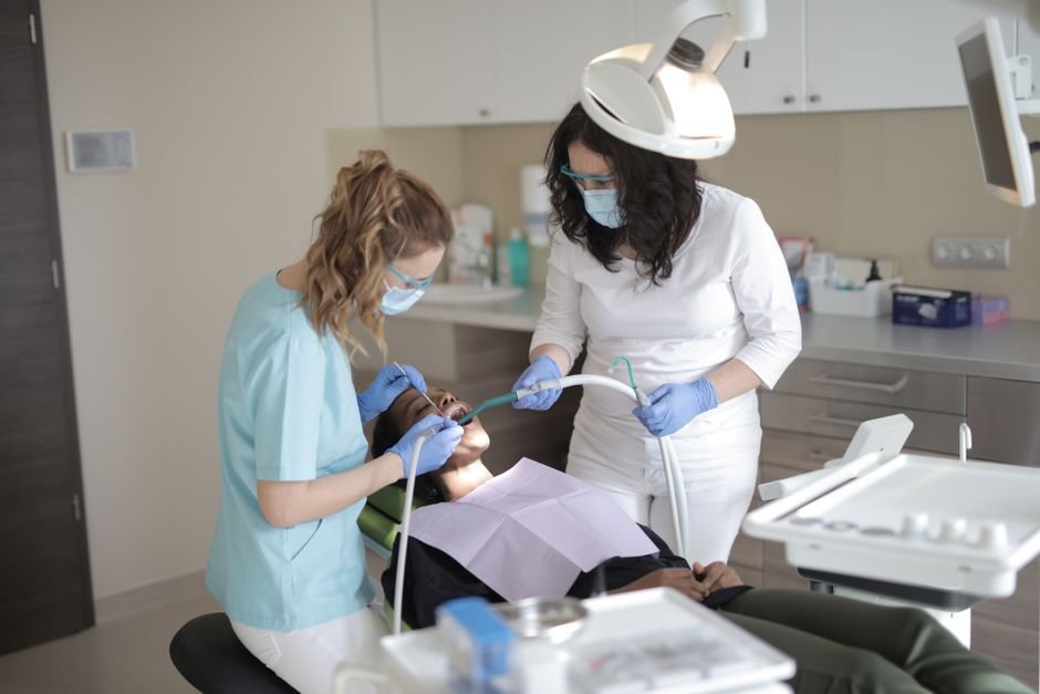 Dentists in a clinic representing top universities in USA for dentistry
